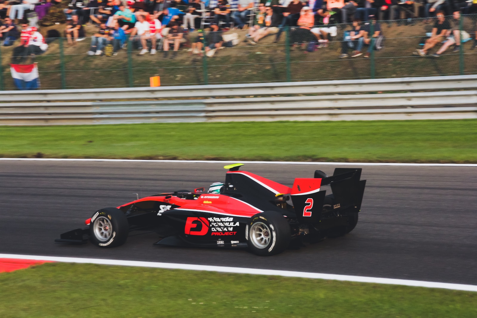 red and black go kart on track